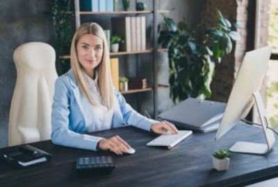 woman at a desk ready to work